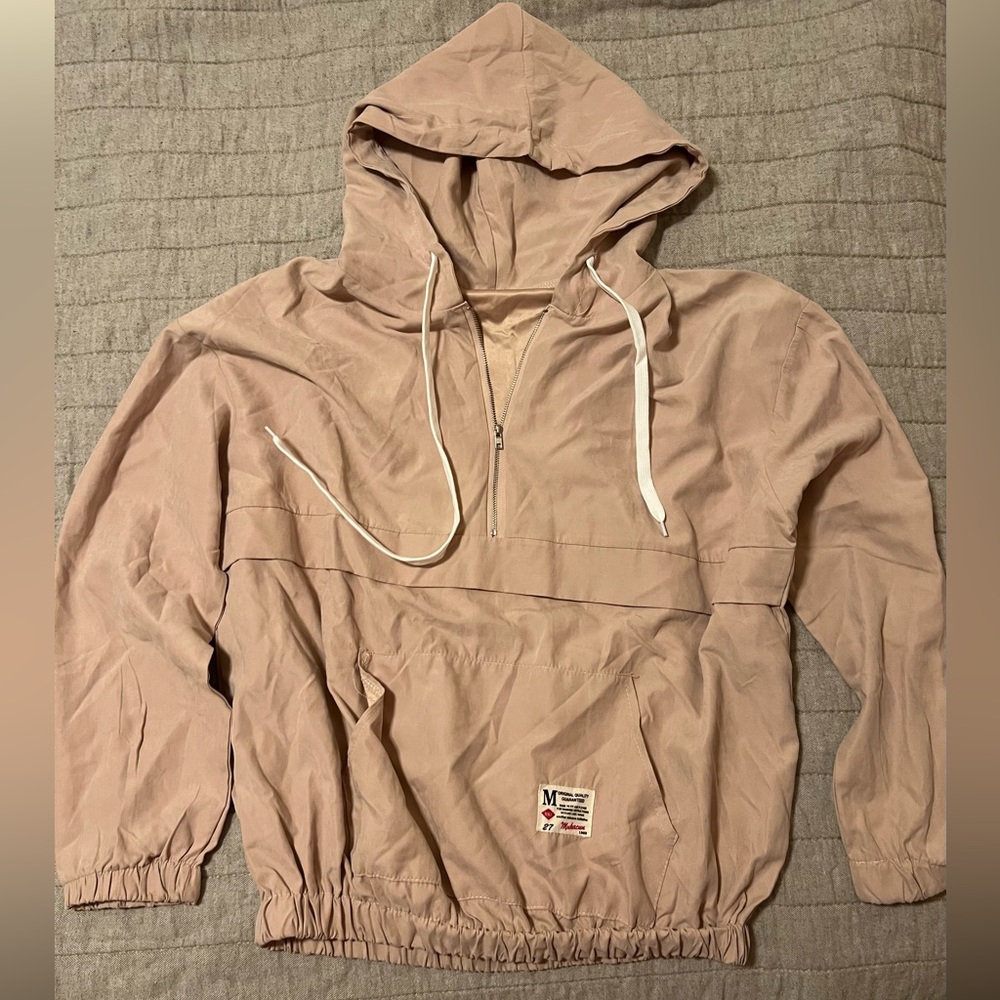 Never worn utility type jacket with hood.